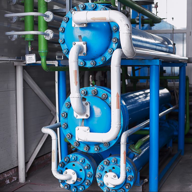 Heat exchanger. Air separation unit. Cryogenic industrial plant. Liquid oxygen factory. Tube and vessel.
